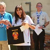 MP Sureena Brackenridge presents a pendant to leader of 50 years: Steve Rogers.