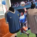 Diego Maradona's 'Hand of God' goal is pictured between Argentina and England shirts