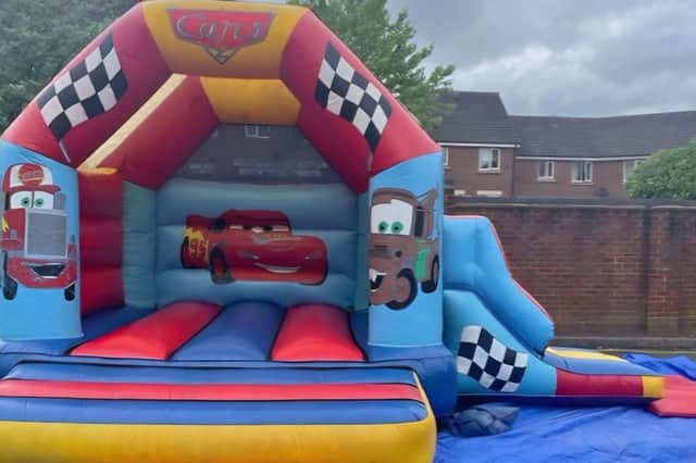 The bouncy castle was used to entertain the children of the local community
