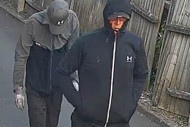 The pair were spotted covering their faces as they entered the pub garden to take the bouncy castle