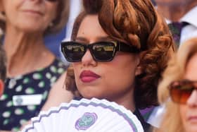 Raye fanning herself in the Royal Box at Wimbledon