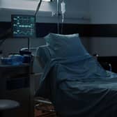 An empty hospital bed