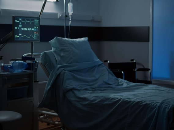 An empty hospital bed