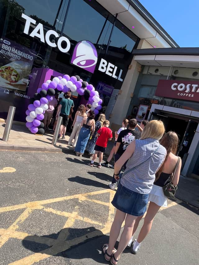 Queue outside the new Taco Bell restaurant at Merry Hill on opening day