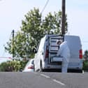 Forensic investigators at the scene