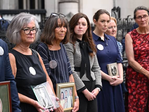 Families of those who died in the 1994 Chinook crash outside the Royal Courts of Justice on Tuesday (Doug Peters/PA)
