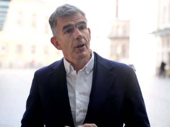 Matt Brittin speaking while standing outside