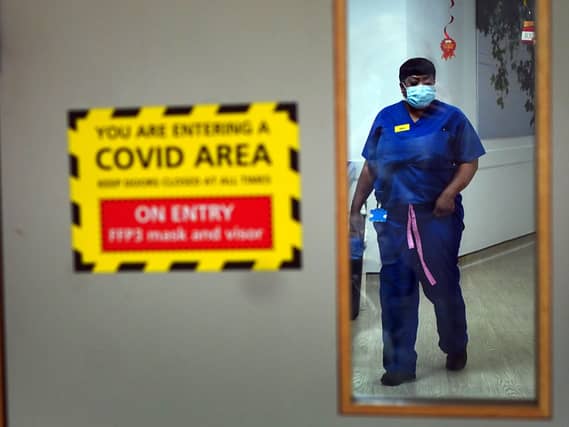 A nurse wearing PPE in a hospital during the Covid pandemic