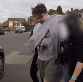 Owen Flowers could be seen laughing as he was arrested for his role in a multi-million-pound hack into Transport for London