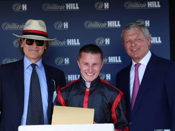 (left to right) Owner George Waud, jockey Tom Marquand and trainer William Haggas