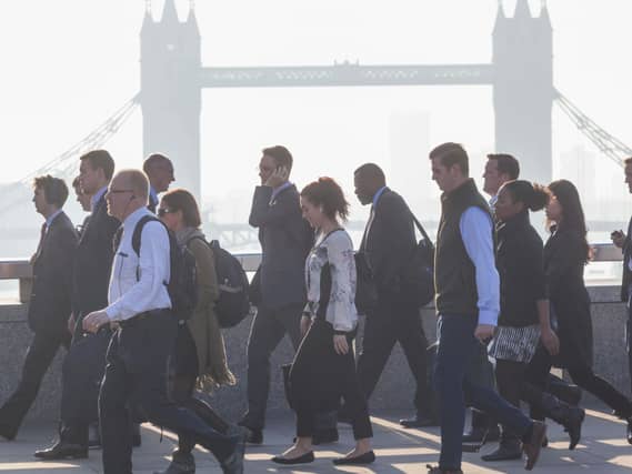 Commuters Crossing London Bridge