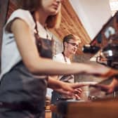 Cafe workers serving customers