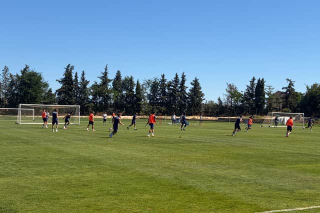 Football... with four goals! Albion split into two teams and try to score in four goals across the span of two pitches.