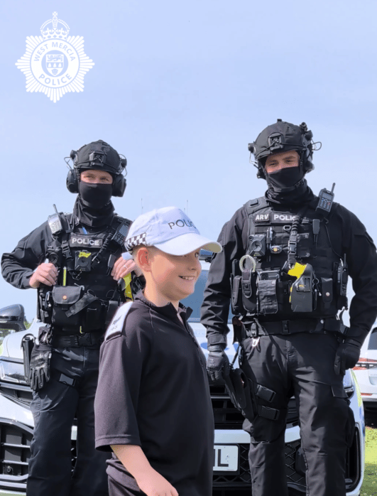 James meeting armed police officers