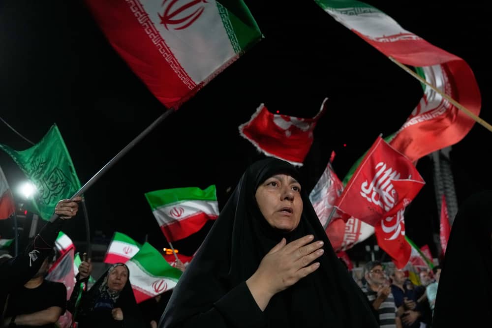 Pro-government demonstrators gather at a square in Tehran