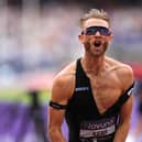 Josh Kerr celebrates breaking the mile world record