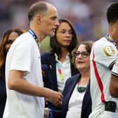 England manager Thomas Tuchel, left, receives his medal following the World Cup third-place play-off