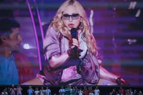 Madonna performs during half time of the World Cup final