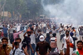 Supporters of the Cockroach Janta Party attempt to march to India’s Parliament