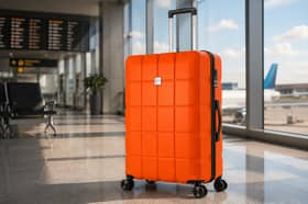 The bright orange ATX suitcase is designed to stand out on the baggage carousel while offering 110 litres of storage space.