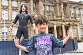 William Qureshi, eight, visits the giant inflatable Ozzy in Victoria Square on "Ozzy Day".