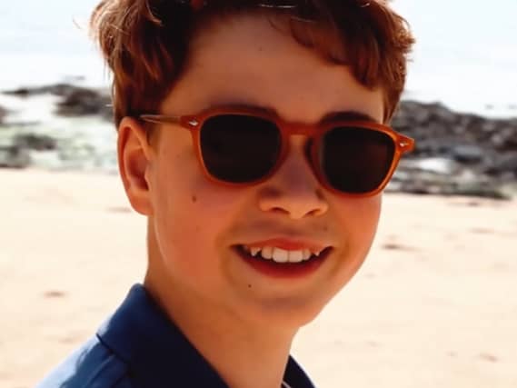 Prince George on the beach in the footage released to mark his 13th birthday