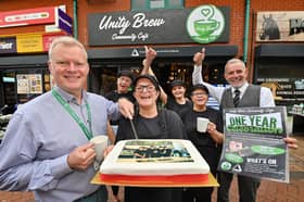 The Groundwork funded Community Cafe: Unity Brew, is celebrating its first birthday. It has connections to Steve Bull, via family members that work there and for Groundwork. At the front cutting the cake is Andrew Thompson (Chief Executive of Groundwork), with the cake is: Kim Thorley, and with them is: Kate Penn, Ellie Watts, Lynda Watts and from Groundwork Alan Bull. Alan Kim, Lynda and Bullys sisters and brother and Ellie is his niece.