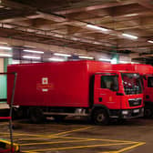 Royal Mail delivery vans parked up inside the Whitechapel delivery office (Victoria Jones/PA)