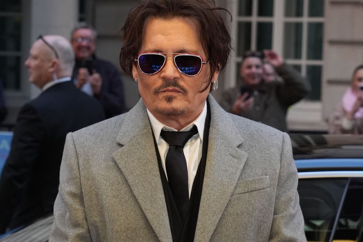 Johnny Depp faces off with supernatural forces as Scrooge in Ebenezer ...