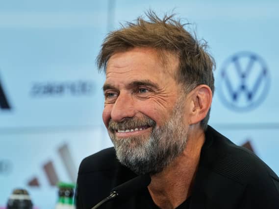 New Germany head coach Jurgen Klopp smiles during a press conference