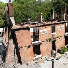 The burnt out remains of The Crooked House in August 2023 (Jacob King/PA)