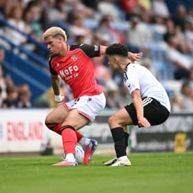 Walsall defender Rico Browne joined Woking on loan until January.