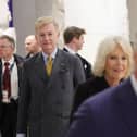 The King, Queen Consort and their private secretary Sir Clive Alderton (centre) during a visit to the Bundestag