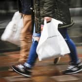 Someone with shopping bags