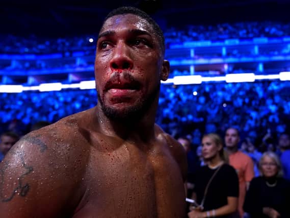 Anthony Joshua celebrates a win
