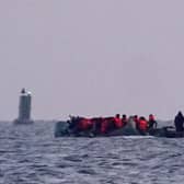 People head out to sea after leaving the beach near Dunkirk