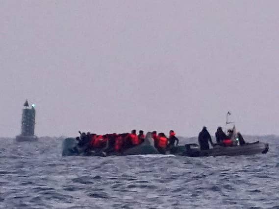 People head out to sea after leaving the beach near Dunkirk