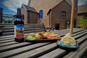 Heavenly Baking's outside seating area at The Red House Glass Cone