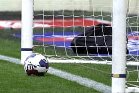 Football and goal posts
