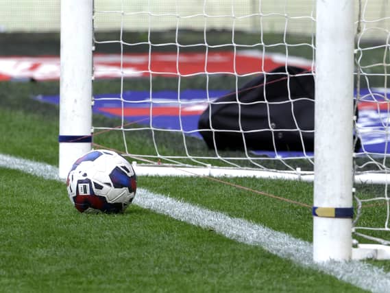 Football and goal posts