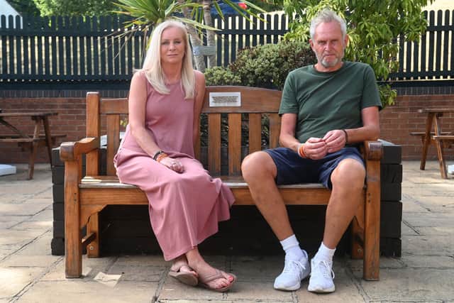 Ryan’s mom Gill Taylor and dad Ade Passey on Ryan’s bench at the Raven Pub, Brierley Hill