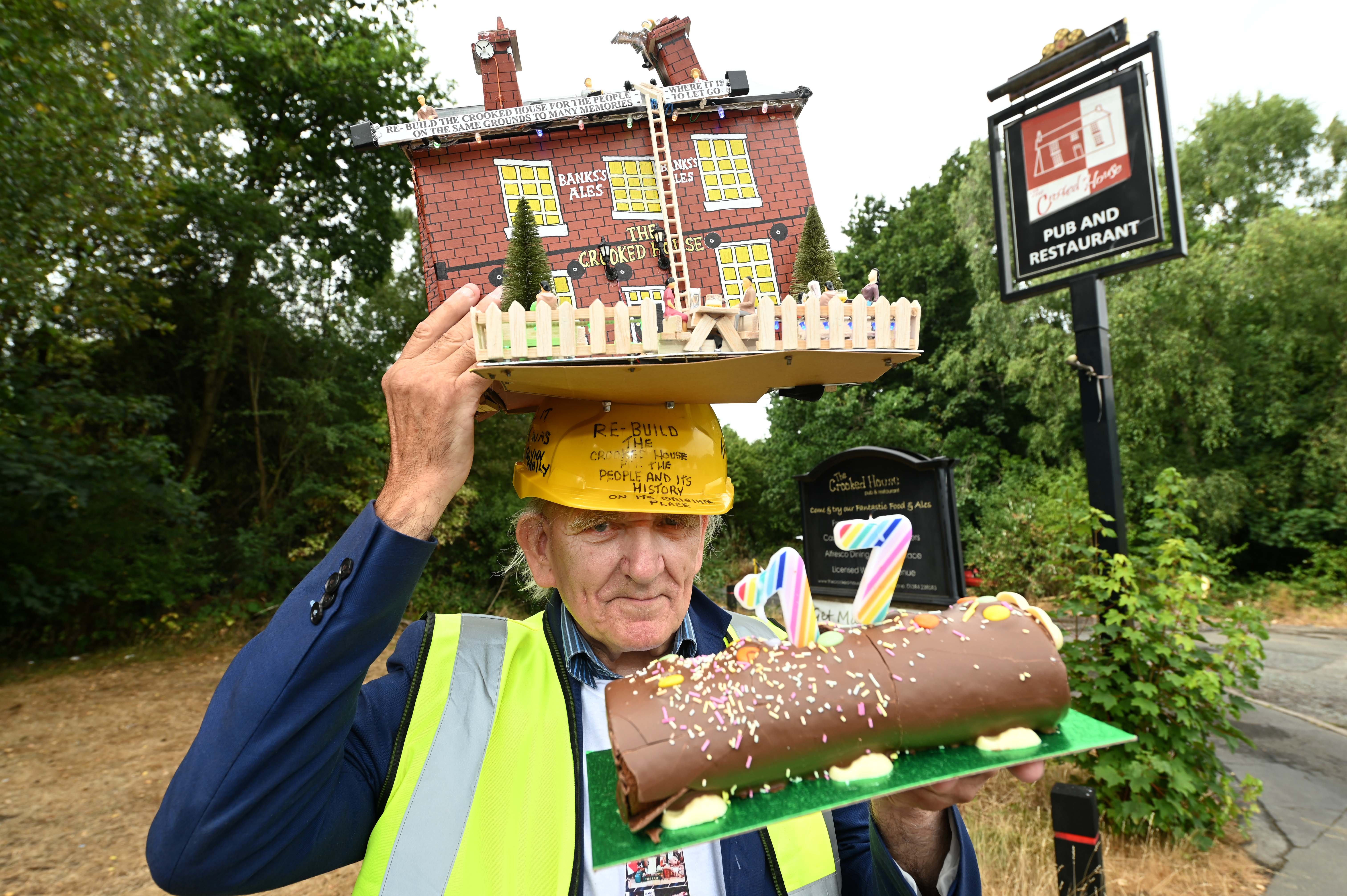 Crooked House campaigner celebrates birthday with cake and quirky hat as ...