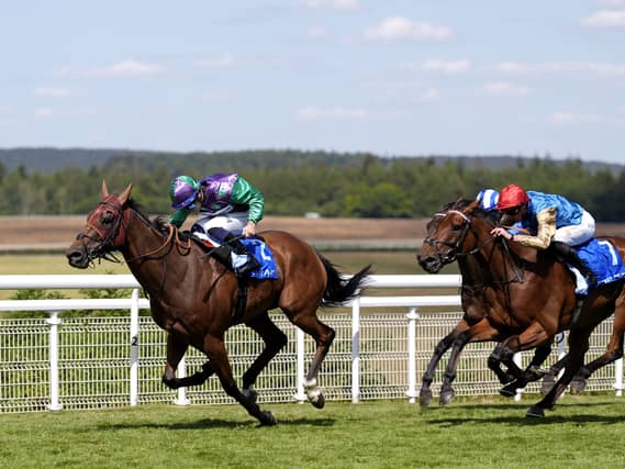 Enfjaar (left) makes all the running for Ray Dawson