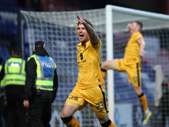 Robbie Muirhead celebrates scoring for Livingston