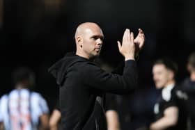 St Mirren manager Craig McLeish applauds the crowd