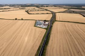 Aerial view of dry, harvested fields in the sunshine