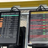 Departure board showing delays and cancellations at Liverpool South Parkway station, as an electricity supply failure at a communications centre is causing major disruption to trains in the Midlands and north-west England