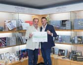 Arthur Price chairman Simon Price and chief executive James Price donate £1,500 to Lichfield charity