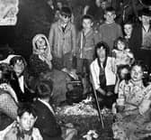 Walter Williams, the boy right of centre wearing a jumper and with a big smile, visits a Romany camp in Wolverhampton in May 1940.