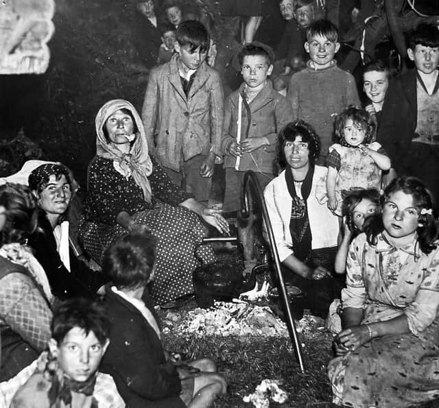 Young Walter Williams, the boy wearing a jumper and with a beaming smile right of centre, visiting the Romany camp in Wolverhampton in May 1940.